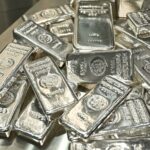 Spot silver extends rally to hit $70 per ounce for first time