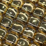 Gold rushes to record high above $5,000/oz 