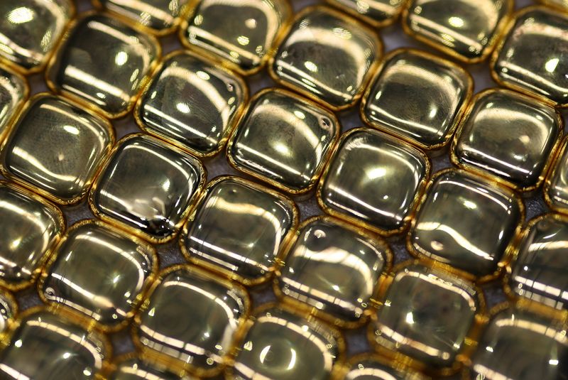 Gold rushes to record high above $5,000/oz 