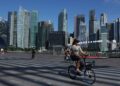 Singapore raises 2026 growth forecast on global economic momentum and AI demand