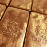 Gold falls from three-week high as dollar firms