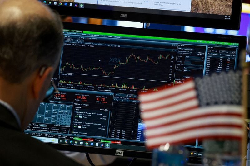 Dow hits record high on US-Iran deal optimism, oil prices slide