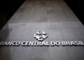 Brazil central bank cuts rates at third straight meeting