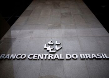Brazil central bank cuts rates at third straight meeting