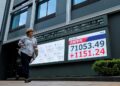 Shares ease as investors ponder US-Iran peace talks; yen nears 40-year lows
