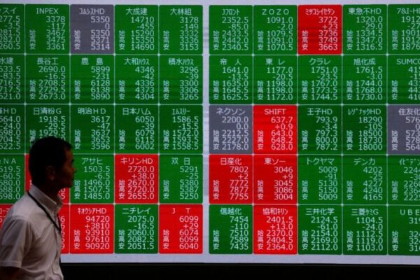 Asia shares slip as markets reprice Fed expectations, oil gains
