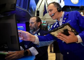 Trading Day: Stocks cap weak month, stellar quarter