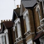 UK housing market downturn eased a little in June, RICS reports