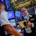 Stocks fall while dollar, bond yields rise as Warsh prompts rate hike bets