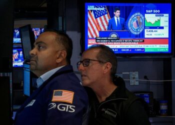 Nasdaq hits record as dollar and Treasury yields climb, oil prices ease