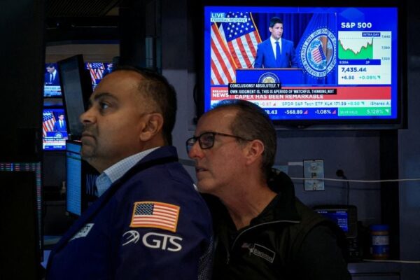 Nasdaq hits record as dollar and Treasury yields climb, oil prices ease