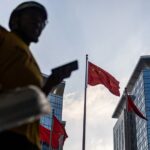 Chinese official says economy resilient but recovery momentum remains weak