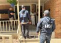 Armed federal agents knock on doors looking for noncitizen voters
