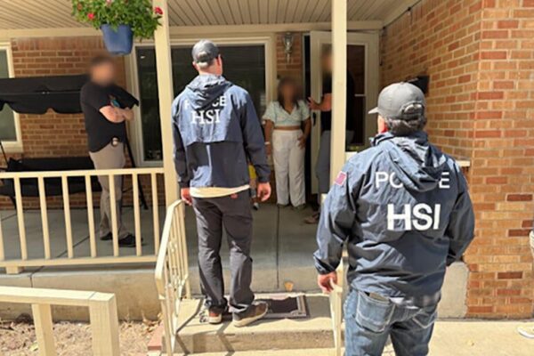 Armed federal agents knock on doors looking for noncitizen voters